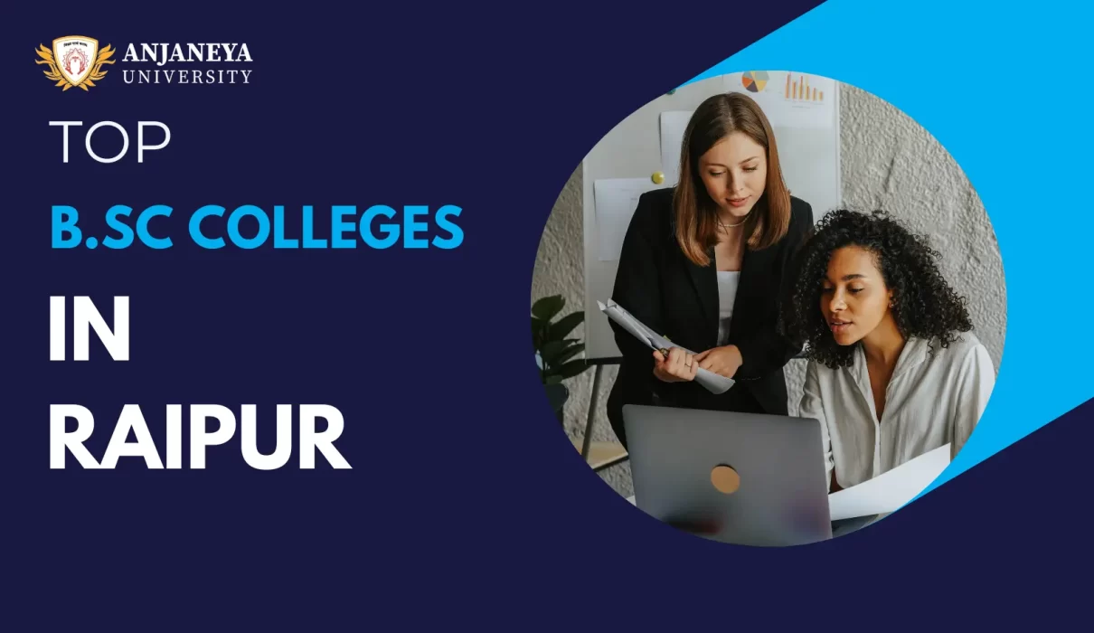 Two female students discussing documents while working on a laptop, featured in a banner for top B.Sc colleges in Raipur by Anjaneya University.