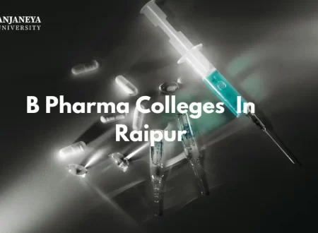 B Pharma Colleges in Raipur - syringe, capsules, and vials on a dark surface representing pharmaceutical studies.