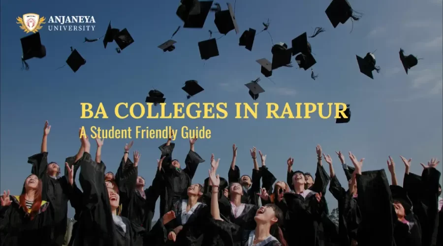 Students celebrating graduation by throwing caps in the air with BA Colleges in Raipur banner from Anjaneya University.