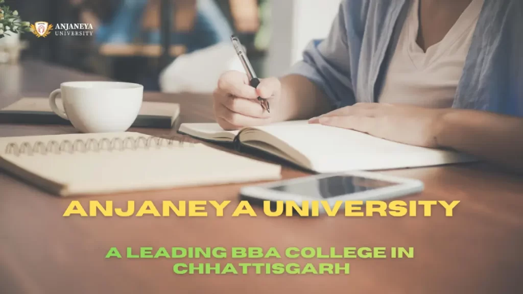 Student writing in a notebook at Anjaneya University representing BBA education in Chhattisgarh