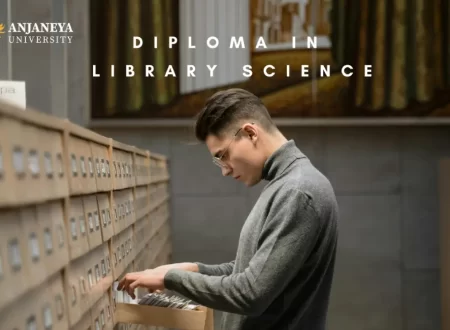 A student browsing through a library card catalog drawer at Anjaneya University, representing the Diploma in Library Science program.